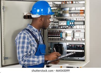 black guy looking at electrical box|2,863 Black Electrical Engineer Stock Photos & High.